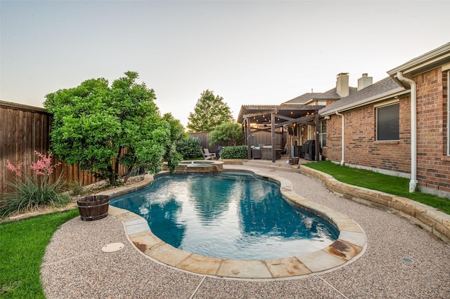 1350 Amistad Dr, Prosper, TX 75078 - view of swimming pool featuring a fenced backyard, a patio, and a pool with connected hot tub