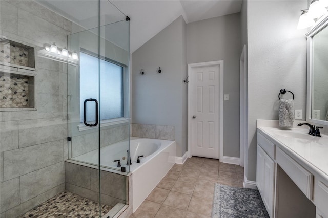 1350 Amistad Dr, Prosper, TX 75078 - bathroom featuring vanity, a garden tub, a shower stall, tile patterned floors, and baseboards