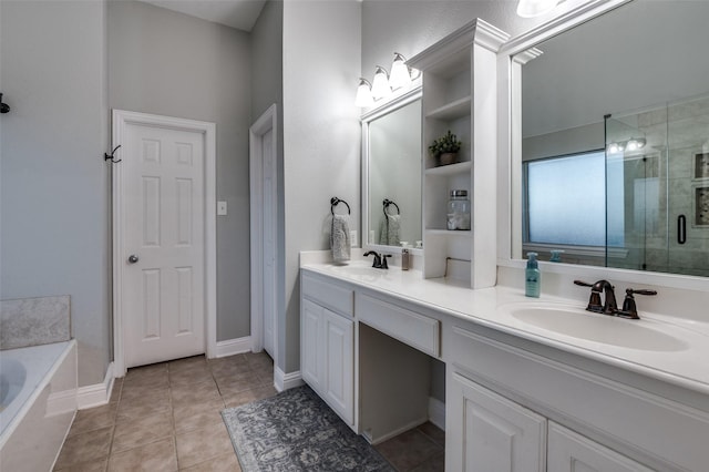 1350 Amistad Dr, Prosper, TX 75078 - bathroom with double vanity, a shower stall, a garden tub, tile patterned floors, and baseboards