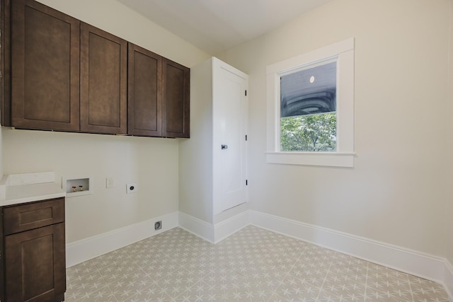 5532 Reiger Ave, Dallas, TX 75214 - laundry area featuring hookup for an electric dryer, cabinet space, washer hookup, and baseboards
