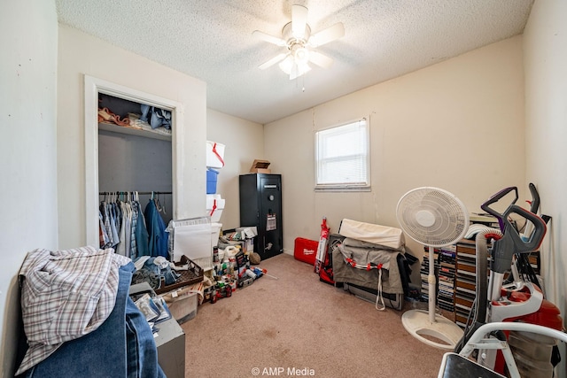 1302 6th St, Anson, TX 79501 - rec room with carpet floors, ceiling fan, and a textured ceiling