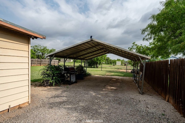 1302 6th St, Anson, TX 79501 - view of car parking featuring a detached carport and driveway