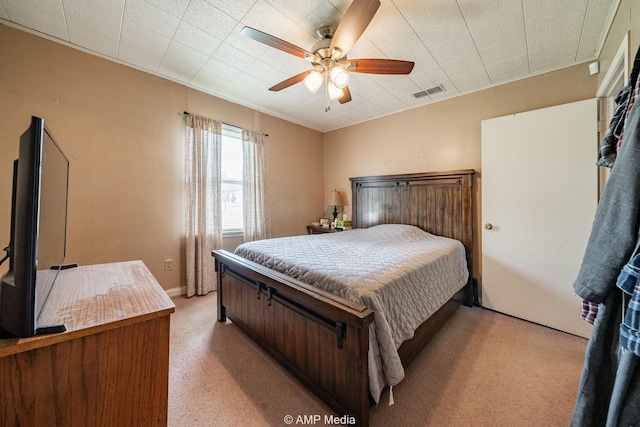 1302 6th St, Anson, TX 79501 - bedroom featuring light carpet and ceiling fan