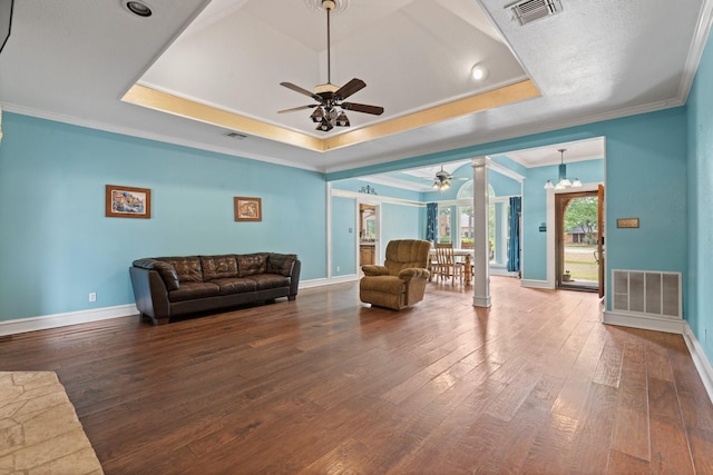 124 Bent Tree Trl, Burleson, TX 76028 - living area with a ceiling fan, crown molding, hardwood / wood-style flooring, a tray ceiling, and baseboards