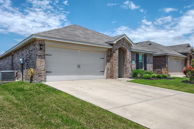 117 Sir Barton Ln, Caddo Mills, TX 75135 - ranch-style house featuring brick siding, a garage, concrete driveway, and central AC