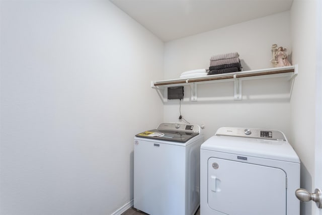 117 Sir Barton Ln, Caddo Mills, TX 75135 - washroom with separate washer and dryer and baseboards