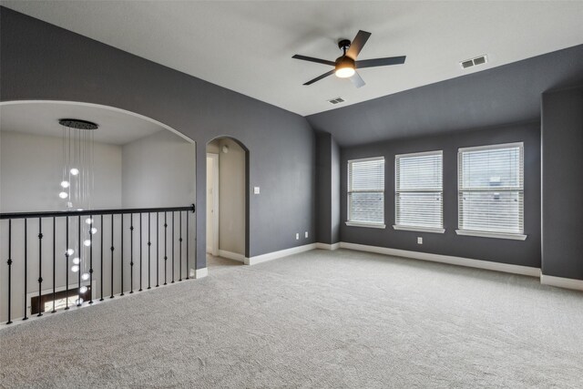 716 Field Xing, Little Elm, TX 76227 - carpeted spare room with a ceiling fan, lofted ceiling, arched walkways, and baseboards