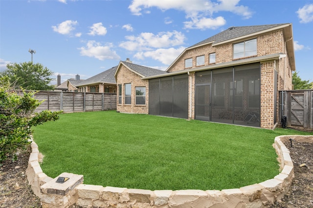716 Field Xing, Little Elm, TX 76227 - back of house with brick siding, a sunroom, and a shingled roof