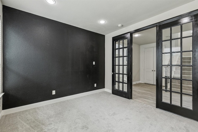 716 Field Xing, Little Elm, TX 76227 - carpeted spare room with french doors, baseboards, and recessed lighting
