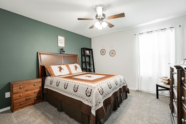 107 Alydar Ln, Caddo Mills, TX 75135 - carpeted bedroom with a ceiling fan and baseboards