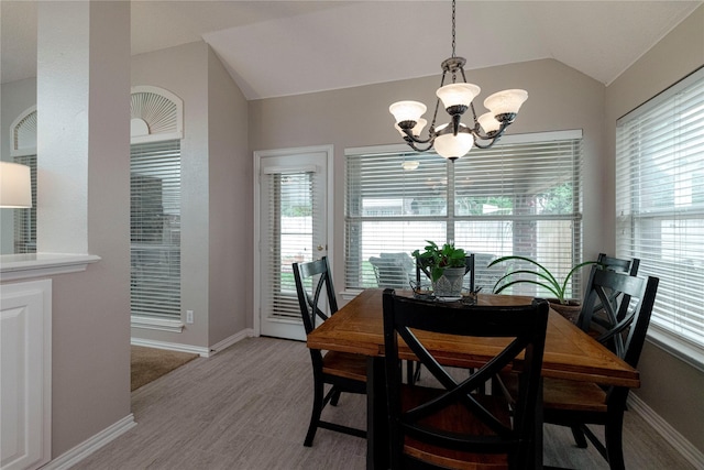 7951 Belladonna Dr, Fort Worth, TX 76123 - dining space with a chandelier, vaulted ceiling, light wood finished floors, and baseboards