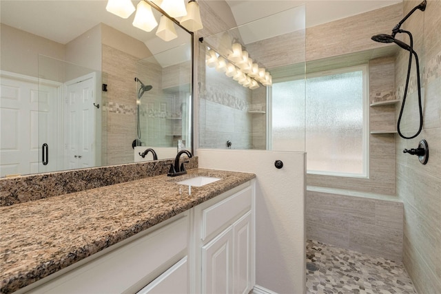 7951 Belladonna Dr, Fort Worth, TX 76123 - bathroom featuring tiled shower and vanity