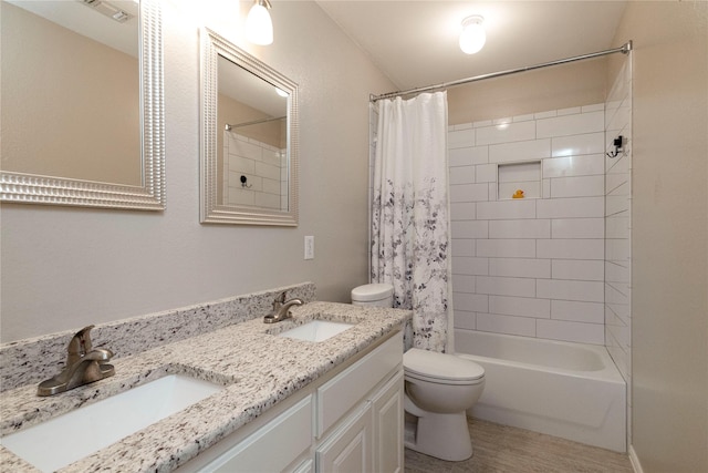 7951 Belladonna Dr, Fort Worth, TX 76123 - full bathroom with toilet, double vanity, shower / bath combo with shower curtain, and wood finished floors