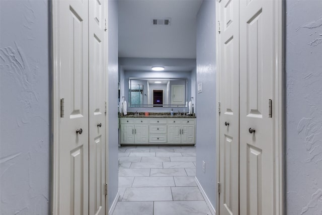 10220 Shadow Way, Dallas, TX 75243 - bathroom with a closet and double vanity