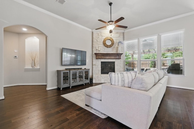 14513 Mediterranean Dr, Frisco, TX 75035 - living room with a ceiling fan, hardwood / wood-style floors, crown molding, baseboards, and a fireplace