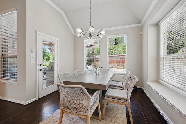 14513 Mediterranean Dr, Frisco, TX 75035 - dining room featuring vaulted ceiling, a chandelier, dark wood-type flooring, crown molding, and baseboards