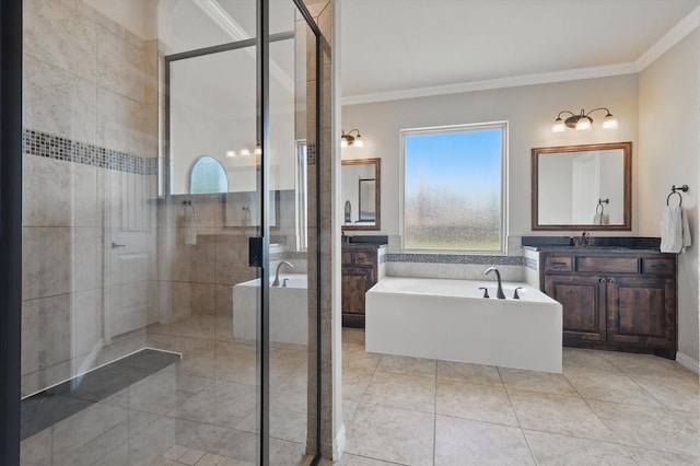 14513 Mediterranean Dr, Frisco, TX 75035 - full bath with ornamental molding, a stall shower, vanity, a garden tub, and tile patterned floors