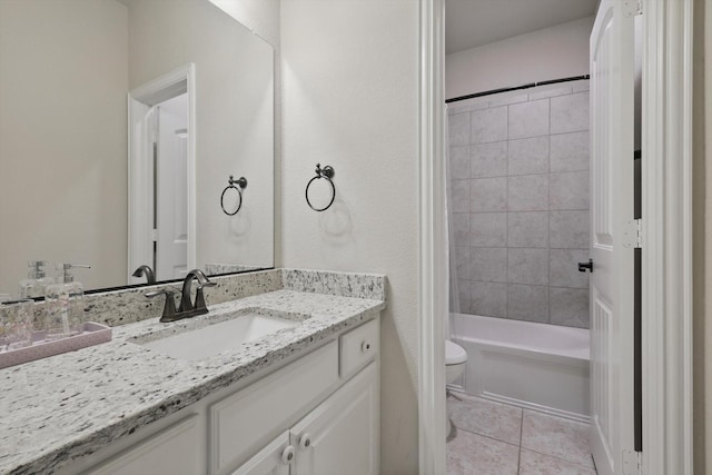 14513 Mediterranean Dr, Frisco, TX 75035 - full bathroom featuring toilet, vanity, tile patterned flooring, and shower / washtub combination