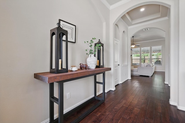 14513 Mediterranean Dr, Frisco, TX 75035 - corridor featuring hardwood / wood-style flooring, crown molding, baseboards, a raised ceiling, and arched walkways