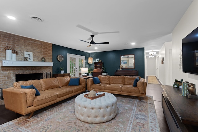 2512 Buckingham Dr, Denton, TX 76209 - living room with wood finished floors, a ceiling fan, a fireplace, and recessed lighting