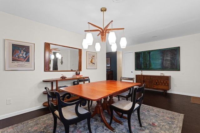 2512 Buckingham Dr, Denton, TX 76209 - dining space featuring baseboards and wood finished floors