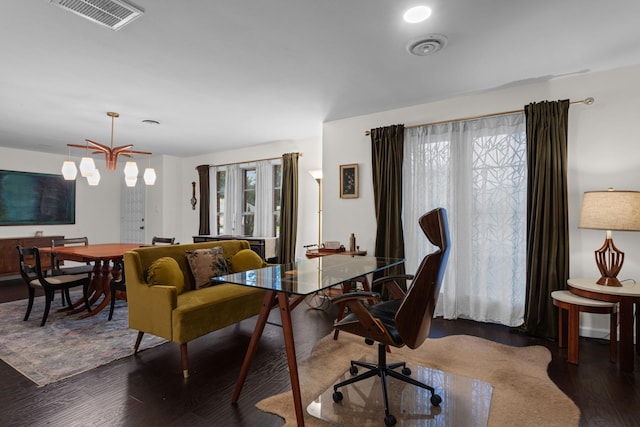 2512 Buckingham Dr, Denton, TX 76209 - dining room with wood finished floors and a chandelier