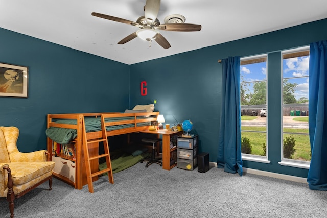2512 Buckingham Dr, Denton, TX 76209 - bedroom with carpet, baseboards, an office area, and a ceiling fan