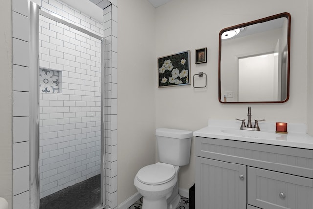 2512 Buckingham Dr, Denton, TX 76209 - bathroom featuring toilet, vanity, and a stall shower