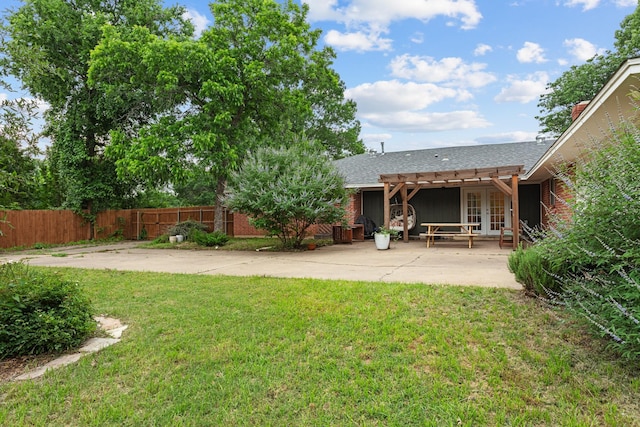 2512 Buckingham Dr, Denton, TX 76209 - rear view of property featuring a pergola, french doors, a patio, and roof with shingles