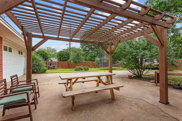 2512 Buckingham Dr, Denton, TX 76209 - view of patio / terrace with a trampoline and a pergola