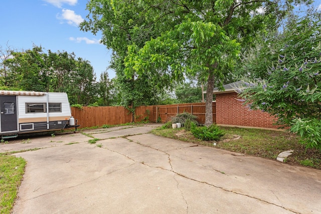 2512 Buckingham Dr, Denton, TX 76209 - fenced backyard with a patio and an outdoor structure