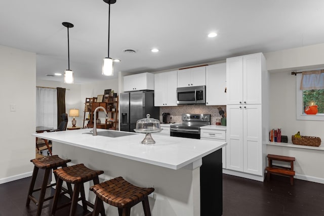 2512 Buckingham Dr, Denton, TX 76209 - kitchen with appliances with stainless steel finishes, a sink, baseboards, tasteful backsplash, and dark wood-type flooring