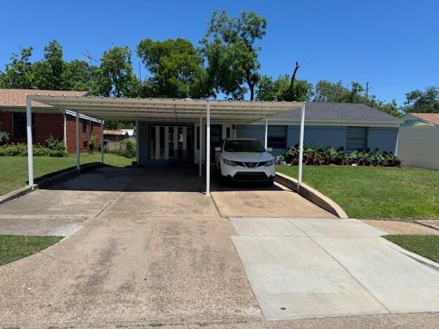 2711 San Diego Dr, Dallas, TX 75228 - view of vehicle parking with concrete driveway