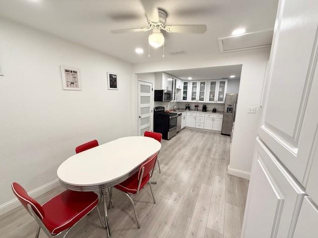 2711 San Diego Dr, Dallas, TX 75228 - dining room featuring light wood finished floors, ceiling fan, baseboards, and recessed lighting
