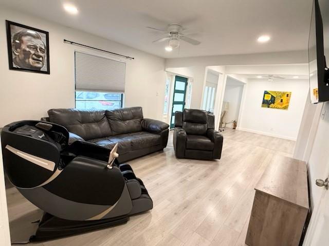 2711 San Diego Dr, Dallas, TX 75228 - living room with a ceiling fan, light wood finished floors, and recessed lighting