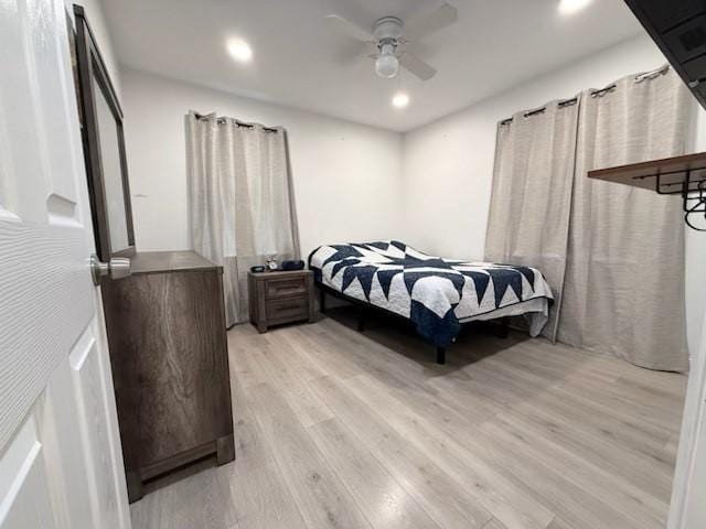2711 San Diego Dr, Dallas, TX 75228 - bedroom with light wood finished floors, recessed lighting, and ceiling fan