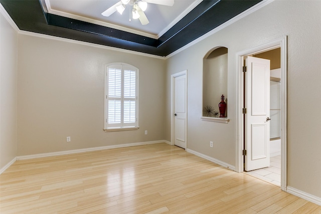 2313 Ember Woods Dr, Keller, TX 76262 - empty room with wood finished floors, a raised ceiling, ceiling fan, ornamental molding, and baseboards