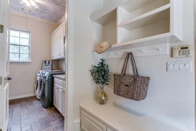 2313 Ember Woods Dr, Keller, TX 76262 - washroom with cabinet space, independent washer and dryer, stone tile floors, ornamental molding, and baseboards