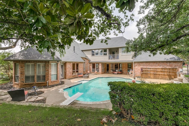 2313 Ember Woods Dr, Keller, TX 76262 - back of house featuring a balcony, brick siding, a patio area, and an outdoor living space
