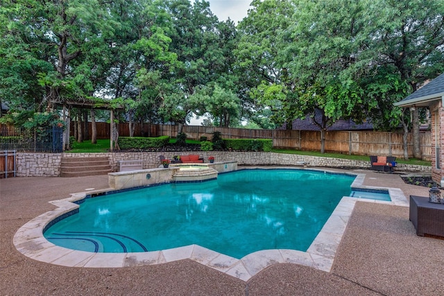 2313 Ember Woods Dr, Keller, TX 76262 - view of swimming pool featuring a fenced backyard, a pool with connected hot tub, and a patio
