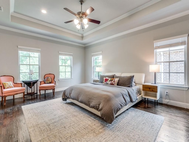916 Shadyside Ln, Dallas, TX 75223 - bedroom featuring a raised ceiling, dark wood-style flooring, ornamental molding, baseboards, and ceiling fan