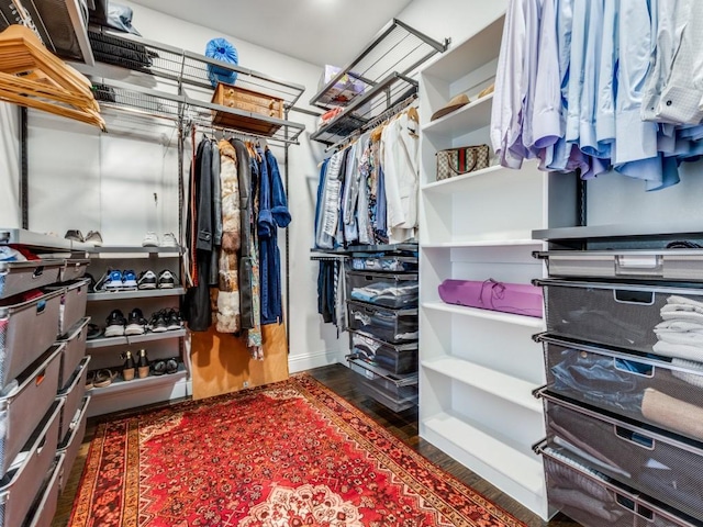 916 Shadyside Ln, Dallas, TX 75223 - walk in closet featuring dark wood-type flooring