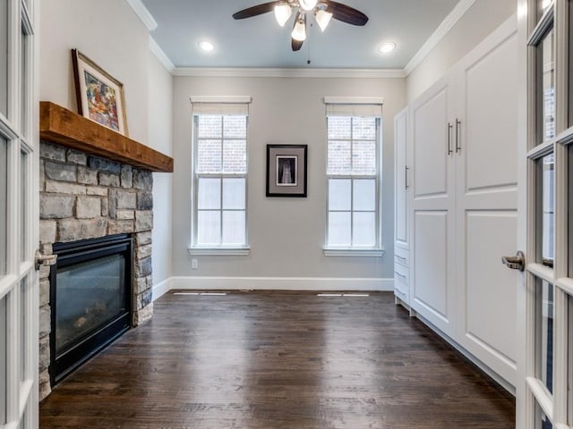 916 Shadyside Ln, Dallas, TX 75223 - unfurnished living room featuring ceiling fan, dark wood finished floors, a fireplace, ornamental molding, and baseboards
