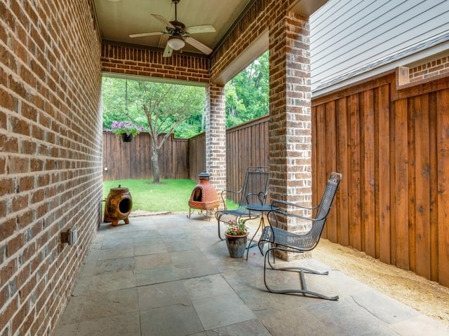 916 Shadyside Ln, Dallas, TX 75223 - fenced backyard with a ceiling fan and a patio