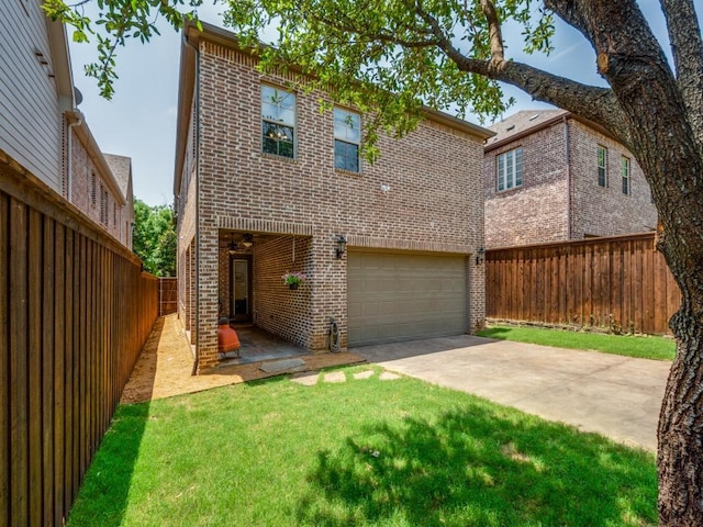 916 Shadyside Ln, Dallas, TX 75223 - traditional home with brick siding, a garage, and concrete driveway