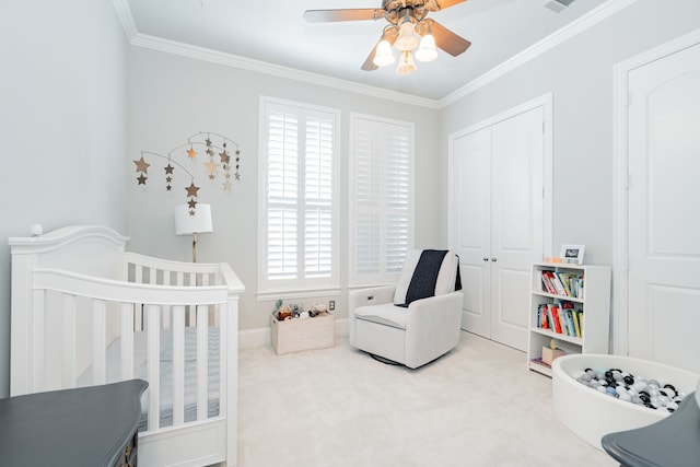 13 Kensington Dr, Heath, TX 75032 - bedroom featuring ornamental molding, carpet flooring, a closet, a crib, and a ceiling fan