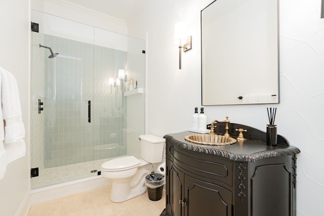 13 Kensington Dr, Heath, TX 75032 - full bathroom featuring vanity, a shower stall, toilet, tile patterned floors, and ornamental molding