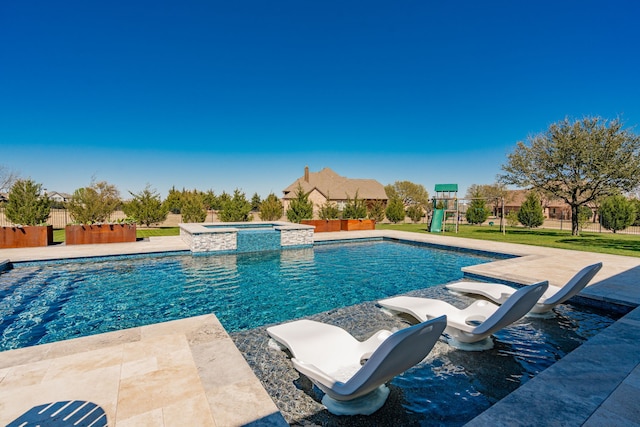 13 Kensington Dr, Heath, TX 75032 - view of swimming pool with a playground, a pool with connected hot tub, and a patio area