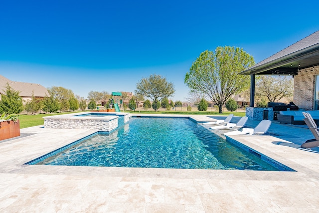 13 Kensington Dr, Heath, TX 75032 - view of swimming pool with a patio and a pool with connected hot tub