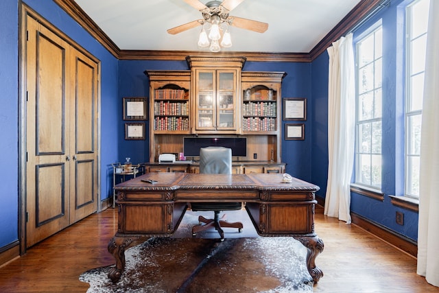 13 Kensington Dr, Heath, TX 75032 - home office featuring a ceiling fan, wood finished floors, baseboards, and crown molding